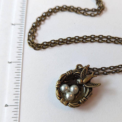 Antique Bronze Sparrow Bird with Nest and Bird Eggs Necklace